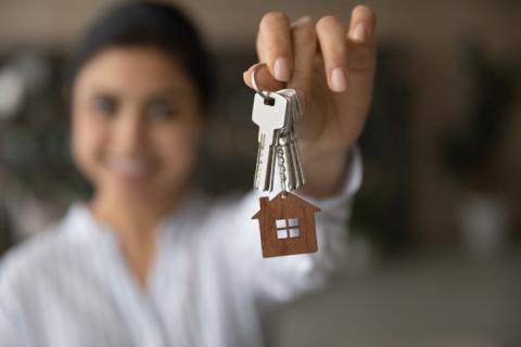 Close up on house keys held by a tenant.